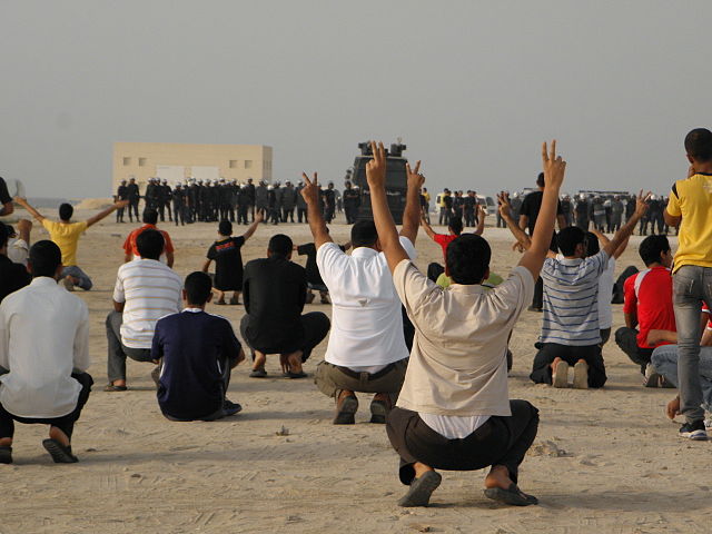 Protesters face riot police in Karbabad, Bahrain. Photo by Bahraini Activist. (CC BY-SA 3.0)