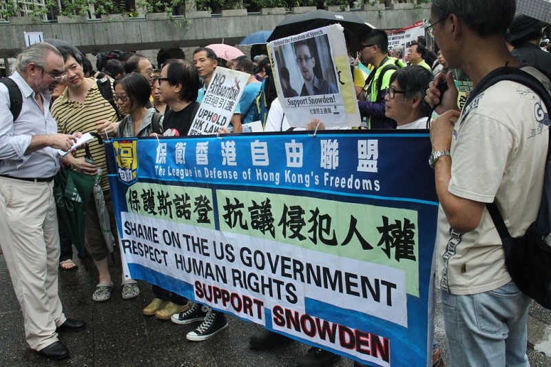 Edward Snowden supporters rally in Hong Kong. Photo by Voice of America. Released to public domain.