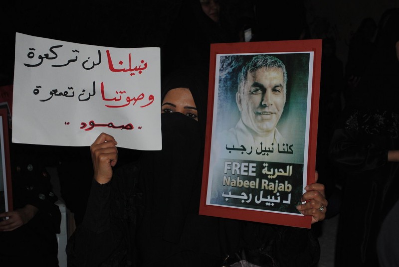 Woman holding a posted in solidarity with Rajab, by Mohamed CJ, used with permission (CC BY-SA 3.0)