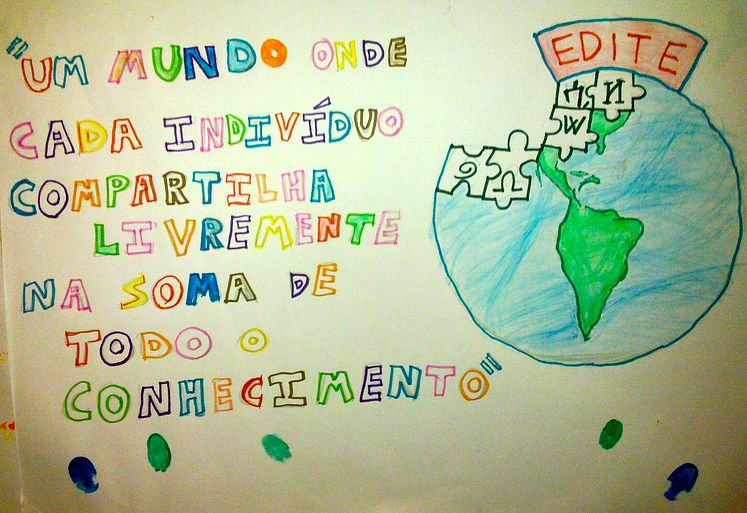 Handmade poster at a Wikipedia volunteer meetup in Brazil: "A world where each person can freely share the sumer of her knowledge." Photo by Solstag via Wikimedia (CC BY-SA 3.0)